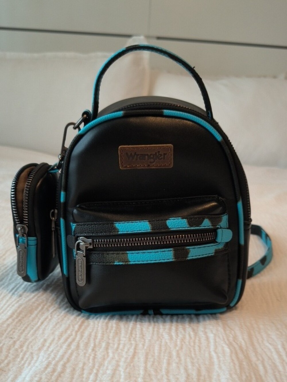 Wrangler Black and Turquoise Mini Backpack with Accent Straps